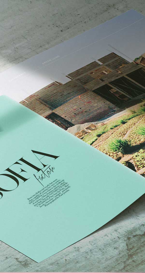 Travel magazine spread designed by Designwise.